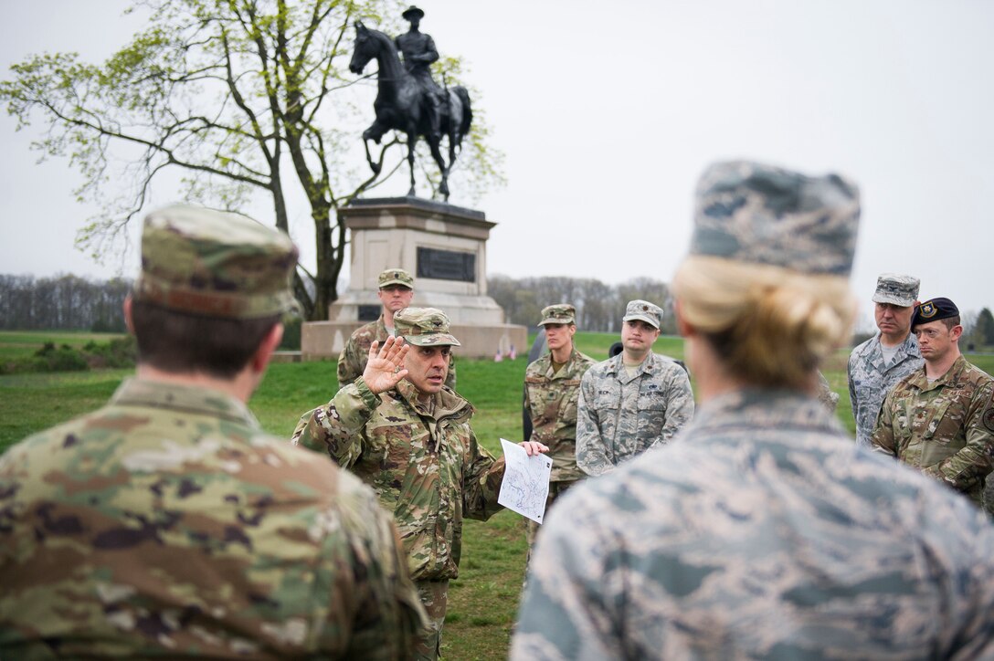 Army Colonel Phillip Cuccia, Army War College academic engagement director, highlights opening actions of Battle of Gettysburg to Air Force field grade officers at Gettysburg National Military Park, Pennsylvania