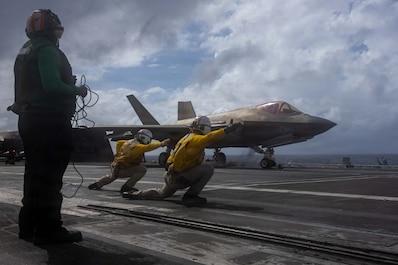 SOUTH CHINA SEA (Dec. 26, 2025) — An F-35C Lightning II, attached to Marine Fighter Attack Squadron (VMFA) 314, prepares to launch from the flight deck of Nimitz-class aircraft carrier USS Abraham Lincoln (CVN 72) on Dec. 26, 2025. The Abraham...