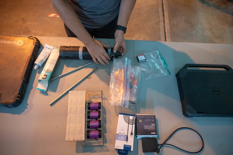 U.S. Army Corps of Engineers Sacramento District team member Ashley Lopez, environmental manager assembles equipment pieces used for the Juvenile Salmon Acoustic Telemetry System (JSATS) receivers that were used for a telemetry survey on Sept. 10, 2025, in Stockton, California. The U.S. Army Corps of Engineers Sacramento District conducts telemetry surveys to close critical data gaps on green sturgeon passage in the lower Sacramento River, providing valuable information to partner agencies for setting river flow requirements, managing dam releases, and improving the survival of  federally protected species. (U.S. Army photo by Bertha Smith, U.S. Army Corps of Engineers Sacramento District Public Affairs)