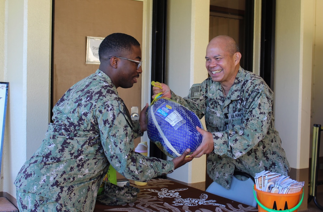 NAVAL BASE GUAM (Nov. 20, 2025) – The U.S. Naval Base Guam (NBG) Chapel distributed turkeys to Sailors during a Holiday Turkey Giveaway at the NBG Chapel, Nov. 20. This year NBG chaplains reached out to tenant command leadership, where respective leadership submitted names of Sailors who were interested in turkeys, including the various Chief Petty Officer and First Class Petty Officer associations that will be making meals for Sailors on Thanksgiving.