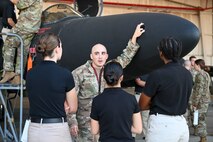 U.S. Air Force Tech. Sgt. Matthew Rentschlar, 9th Aircraft Maintenance Squadron quality assurance inspector, showcases the U-2 Dragon Lady to students enrolled in the San Jose State University Air Force Reserve Officer Training Corps (ROTC) Program-Detachment 045, September 26, 2025, at Beale Air Force Base (AFB), California.