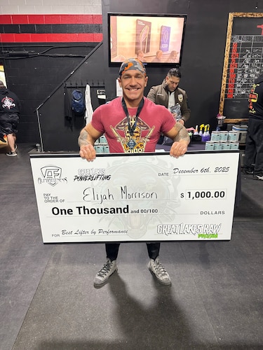 1st Lt. Elijah Morrison, an Air Force Life Cycle Management Center (AFLCMC) Financial Management officer, poses with his reward for winning the United States Powerlifting Coalition competition known as Great Lakes Raw Pro/Am on December 6, 2025 in Detroit, Michigan. Morrison had his strongest performance at this competition and put up personal records in the squat, bench and deadlift categories. (Courtesy Photo)