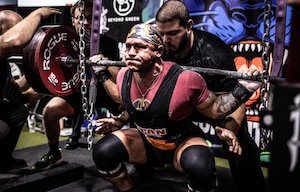 1st Lt. Elijah Morrsion, an Air Force Life Cycle Management Center (AFLCMC) Financial Management officer, performs a squat during a United States Powerlifting Coalition competition known as Great Lakes Raw Pro/Am on December 6, 2025 in Detroit, Michigan. Morrison accomplished a personal record of 650 pounds on squat. (Courtesy Photo)