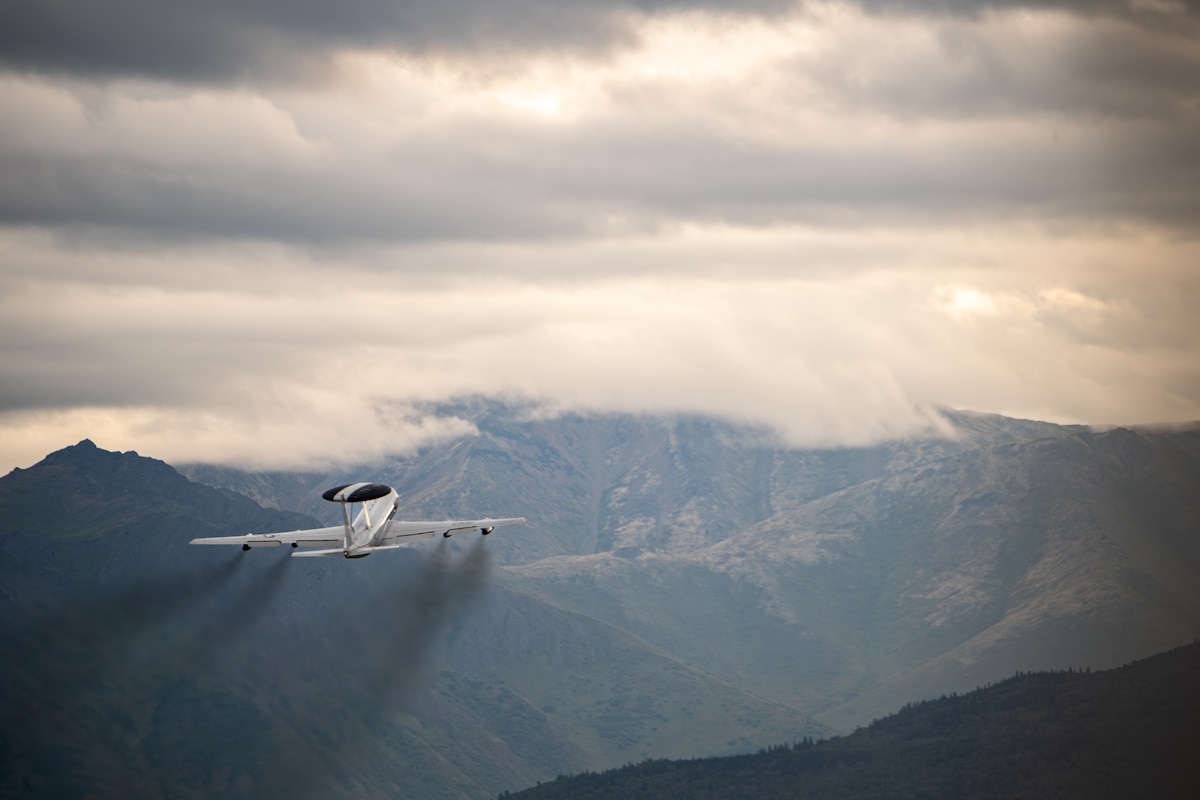 An E-3 Sentry Airborne Warning and Control System aircraft assigned to the 962nd Airborne Air Control Squadron departs Joint Base Elmendorf-Richardson, Alaska, Aug. 19, 2025, for exercise Northern Edge 2025. NE25 is an exercise led by the U.S. Indo-Pacific Command that serves as a platform for joint, multi-domain operations to deliver high-end, realistic warfighter training, strengthen joint interoperability and sharpen the air and sea-based combat readiness of U.S. and participating forces. (U.S. Air Force photo by Airman 1st Class David S. Calcote)
