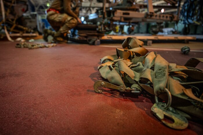 A cargo strap lays on the ground during preparation for shipping cargo in support of Cope North 25 at Misawa Air Base, Japan, Jan. 24, 2025