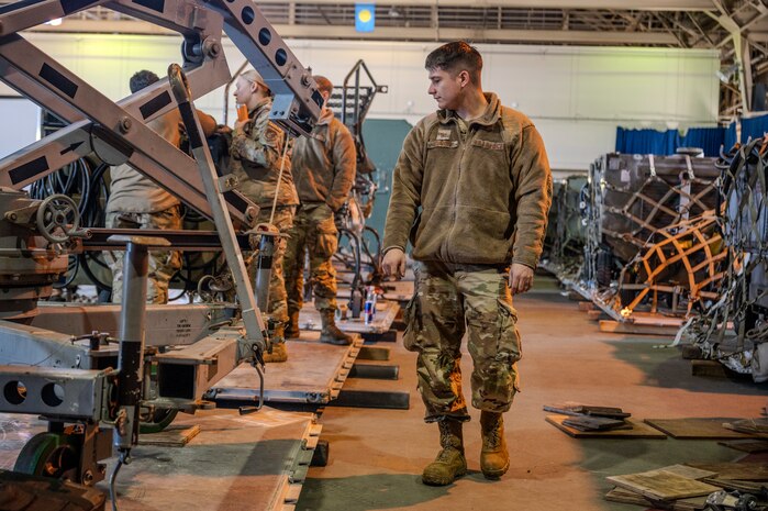 U.S. Air Force Staff Sgt. Joseph Reumont, 372 Training Squadron Detachment 23 field training instructor, inspects equipment during cargo preparation in support of Cope North 25 at Misawa Air Base, Japan, Jan. 24, 2025