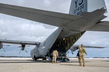 A U.S. Air Force Airman, assigned to the 36th Airlift Squadron, directs cargo loading in preparation of Cope North 25 at Misawa Air Base, Japan, Jan. 29, 2025
