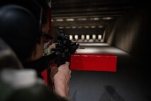 U.S. Air Force Senior Airman Preston Holladay, 35th Civil Engineer Squadron fire crew chief, aims an M4 carbine at a target during a Combat Arms Training and Maintenance (CATM) course at Misawa Air Base, Japan, Jan. 29, 2025
