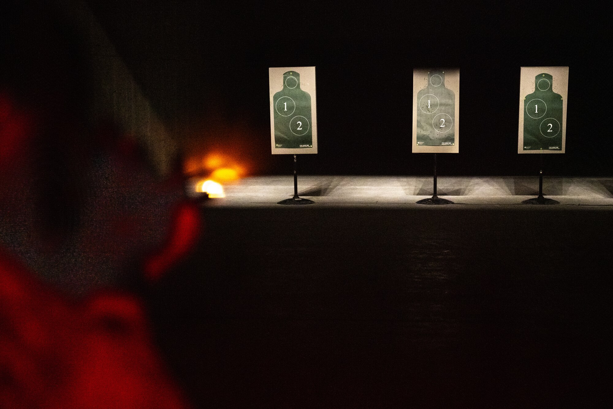 U.S. Air Force Senior Airman Preston Holladay, 35th Civil Engineer Squadron fire crew chief, aims an M4 carbine at targets during a Combat Arms Training and Maintenance course at Misawa Air Base, Japan, Jan. 29, 2025