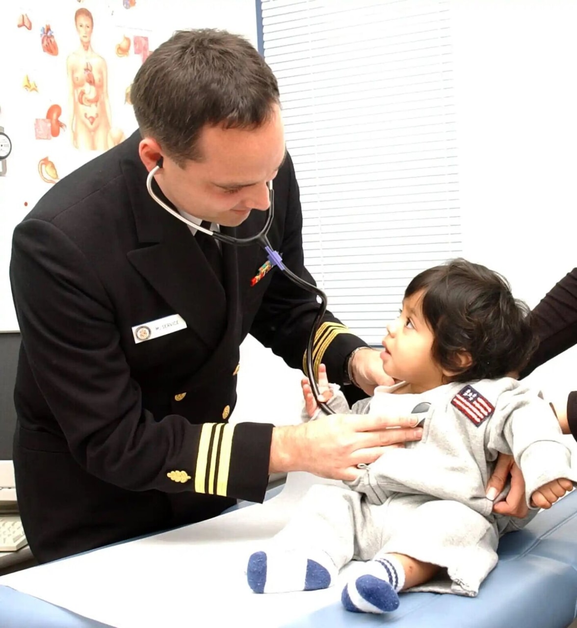 A nurse cares for a child.