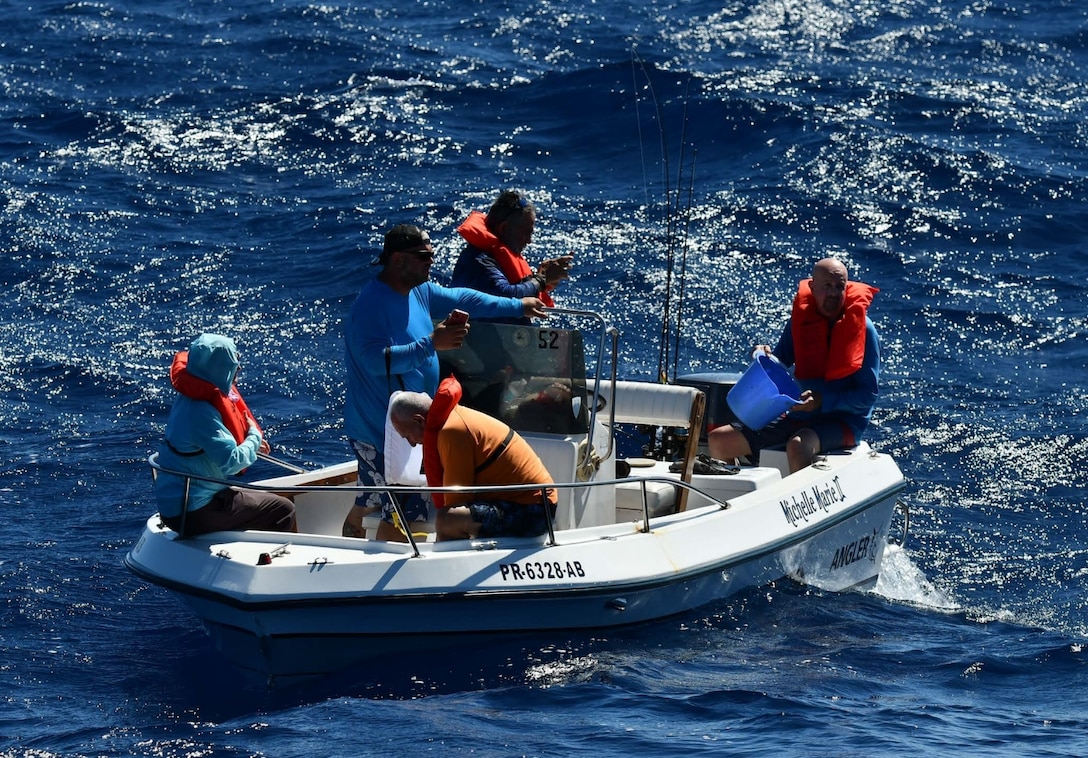 Coast Guard Cutter Joseph Napier crewmembers rescue five boaters from a disabled 18-foot vessel taking on water 13 nautical miles off Cabo Rojo, Puerto Rico, Feb. 1, 2025. The rescued boaters were later embarked aboard a responding commercial vessel and transported to ‘Combate’ Beach in Cabo Rojo, Puerto Rico; no injuries were reported in this case. (U.S. Coast Guard photo)