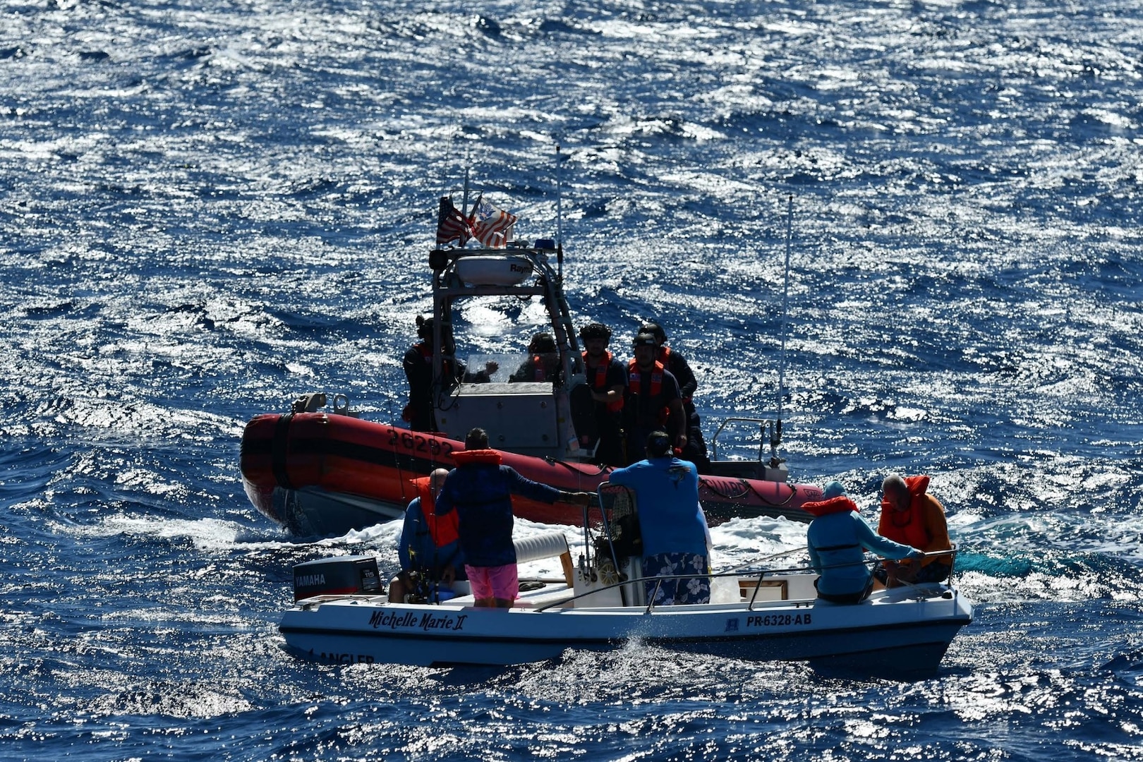 Coast Guard Cutter Joseph Napier crewmembers rescue five boaters from a disabled 18-foot vessel taking on water 13 nautical miles off Cabo Rojo, Puerto Rico, Feb. 1, 2025. The rescued boaters were later embarked aboard a responding commercial vessel and transported to ‘Combate’ Beach in Cabo Rojo, Puerto Rico; no injuries were reported in this case. (U.S. Coast Guard photo)