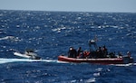 Coast Guard Cutter Joseph Napier crewmembers rescue five boaters from a disabled 18-foot vessel taking on water 13 nautical miles off Cabo Rojo, Puerto Rico, Feb. 1, 2025. The rescued boaters were later embarked aboard a responding commercial vessel and transported to ‘Combate’ Beach in Cabo Rojo, Puerto Rico; no injuries were reported in this case. (U.S. Coast Guard photo)