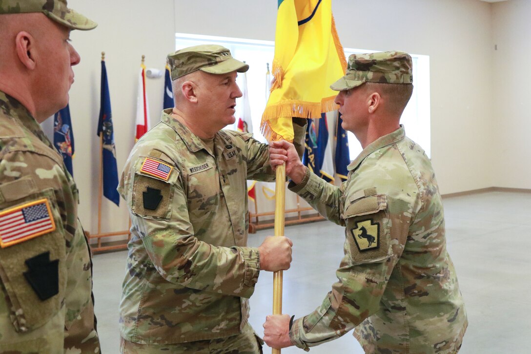 U.S. Army Col. Brad W. Pierson relinquished command of the 55th Maneuver Enhancement Brigade, Pennsylvania Army National Guard to Col. Adam R. Grove during a change of command ceremony at the Scranton Armed Forces Reserve Center Feb. 1, 2025. (U.S. Army National Guard photo by Sgt. 1st Class Shane Smith)
