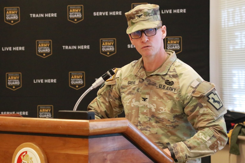 U.S. Army Col. Adam R. Grove speaks at a change of command ceremony after assuming command of the 55th Maneuver Enhancement Brigade, Pennsylvania Army National Guard, from Col. Brad W. Pierson at the Scranton Armed Forces Reserve Center Feb. 1, 2025. (U.S. Army National Guard photo by Sgt. 1st Class Shane Smith)