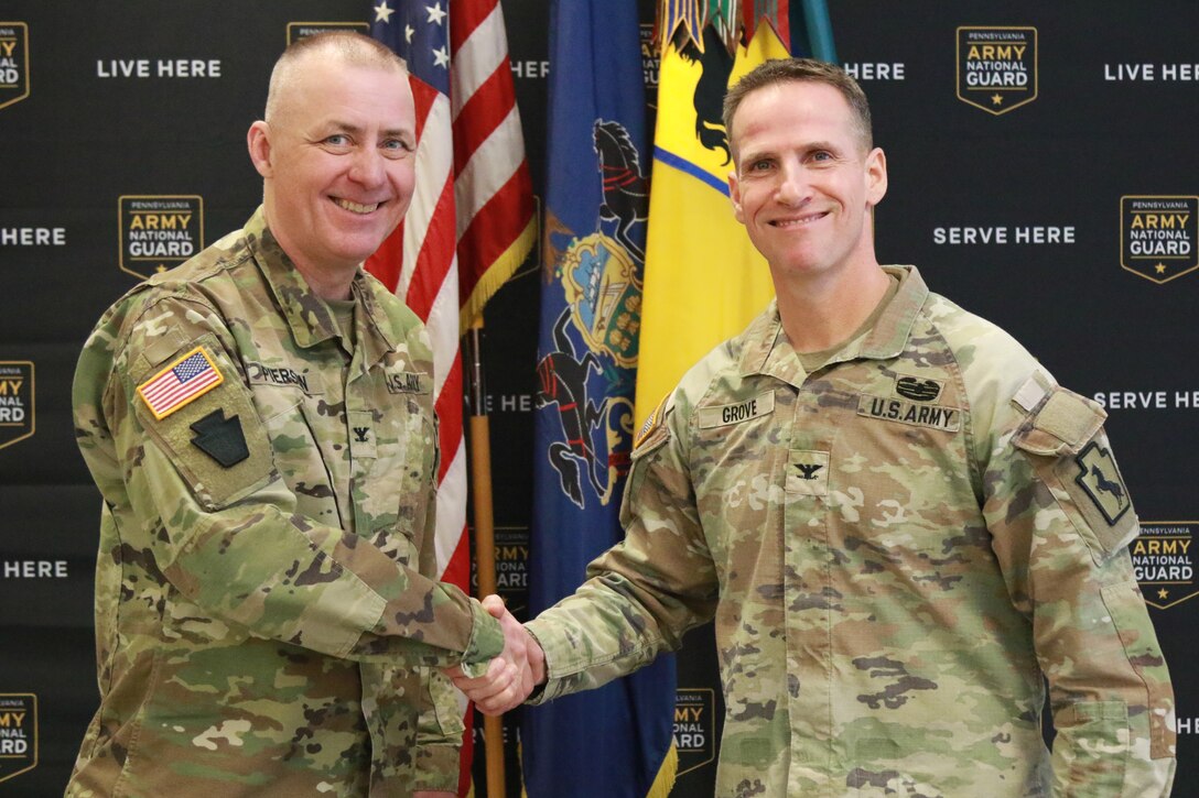 U.S. Army Col. Brad W. Pierson relinquished command of the 55th Maneuver Enhancement Brigade, Pennsylvania Army National Guard to Col. Adam R. Grove during a change of command ceremony at the Scranton Armed Forces Reserve Center Feb. 1, 2025. (U.S. Army National Guard photo by Sgt. 1st Class Shane Smith)