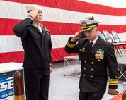 Capt. Paul Stence Jr., Naval Surface Warfare Center Panama City Division's newest commanding officer, salutes and exits at the conclusion of NSWC PCD's change of command ceremony held onboard Naval Support Activity Panama City, Fla., Jan. 31. NSWC PCD leads the Navy’s full spectrum research, development, test and evaluation, engineering, and fleet support of offensive and defensive systems in the littorals. (U.S. Navy photo by Eddie Green)