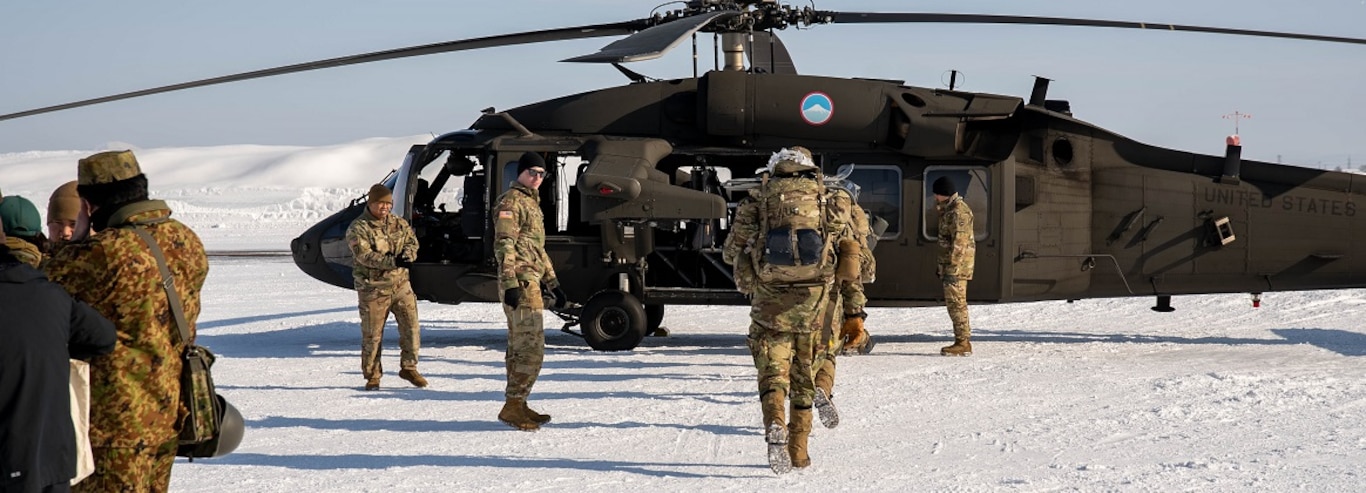 U.S. Army Soldiers from the 1st Battalion, 5th Infantry Regiment practice loading a UH-60 Blackhawk helicopter in Camp Okadama, Japan as part of North Wind 25, February 3, 2025.