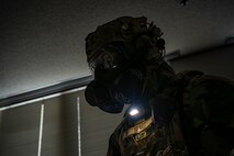 U.S. Air Force Senior Airman Matthew Smart, 35th Civil Engineering Squadron emergency manager, participates in a demonstration during a bilateral chemical, biological, radiological and nuclear (CBRN) training.
