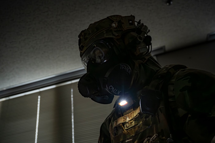 U.S. Air Force Senior Airman Matthew Smart, 35th Civil Engineering Squadron emergency manager, participates in a demonstration during a bilateral chemical, biological, radiological and nuclear (CBRN) training.