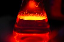 A beaker of a simulated hazardous substance lies on a table during a bilateral chemical, biological, radiological and nuclear (CBRN) training.