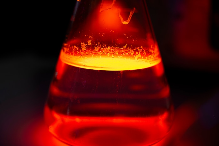 A beaker of a simulated hazardous substance lies on a table during a bilateral chemical, biological, radiological and nuclear (CBRN) training.