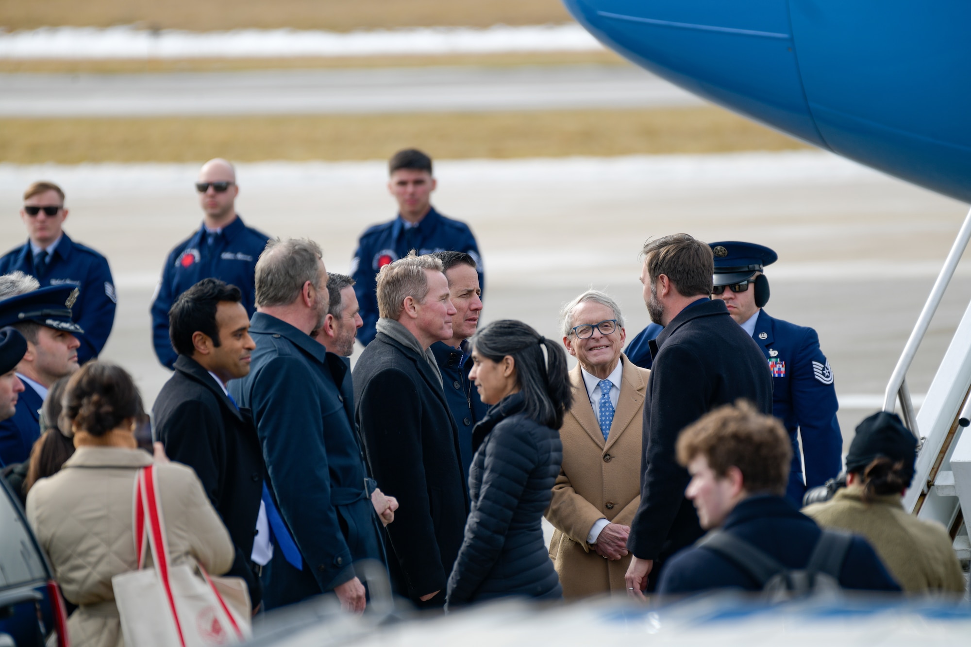 Vice President JD Vance talks with a line of government officials, on Feb. 3, 2025, at Youngstown Air Reserve Station, Ohio.