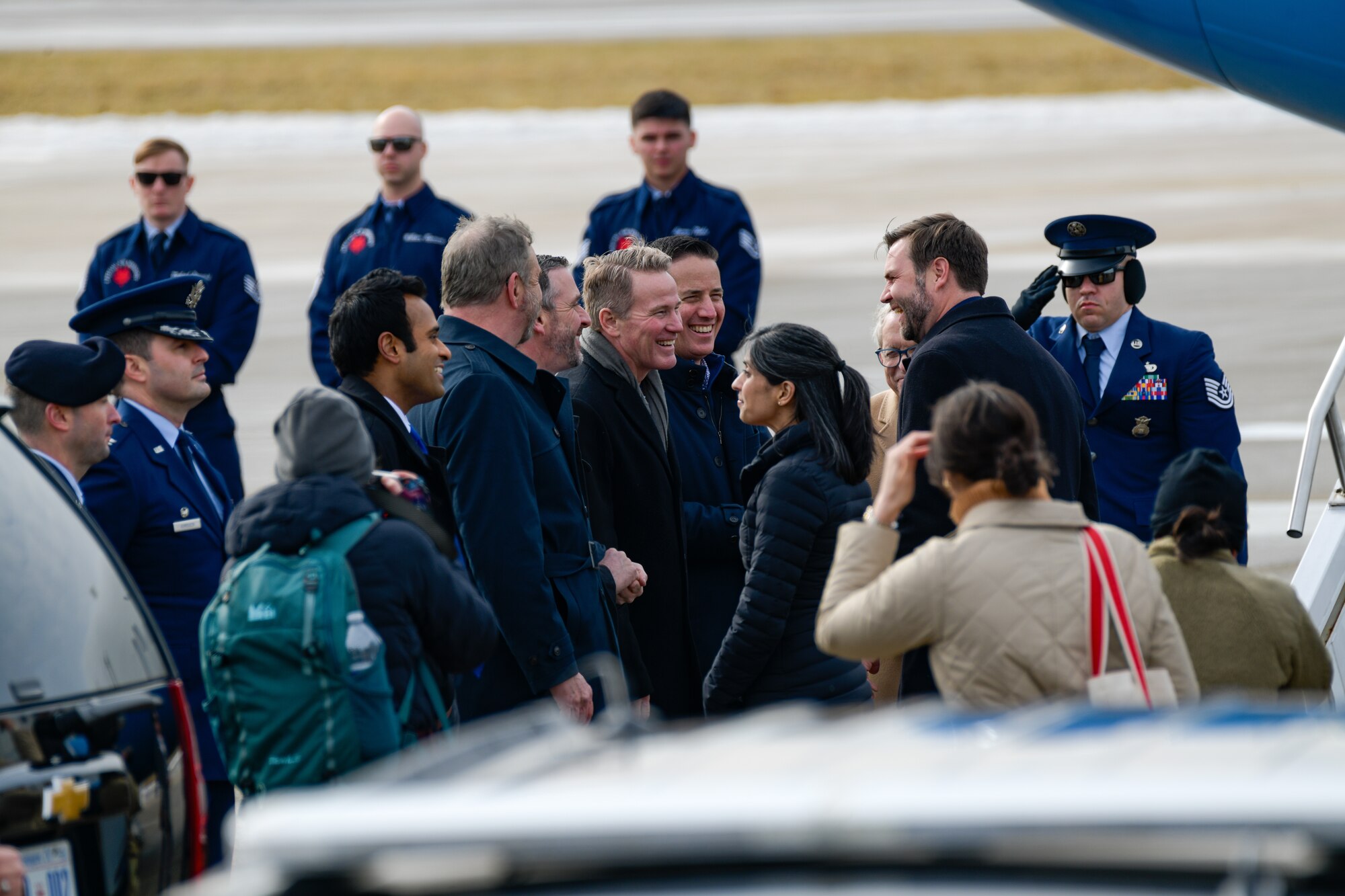 Vice President JD Vance talks with a line of government officials, on Feb. 3, 2025, at Youngstown Air Reserve Station, Ohio.