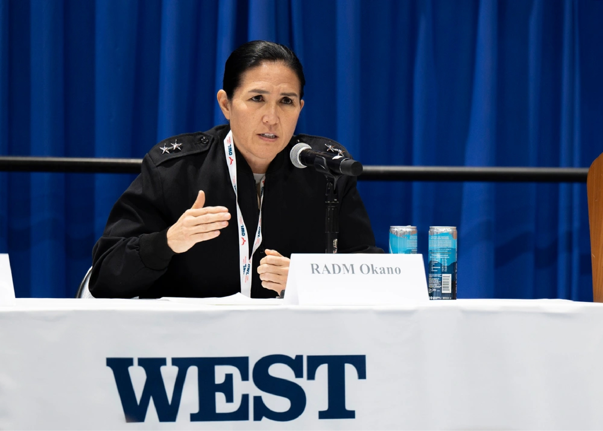 RADM E. S. Okano USN  presents about NAVWAR at WEST 2025: The Future of Multi-Domain Warfare Demands Agility and Audacious Innovation