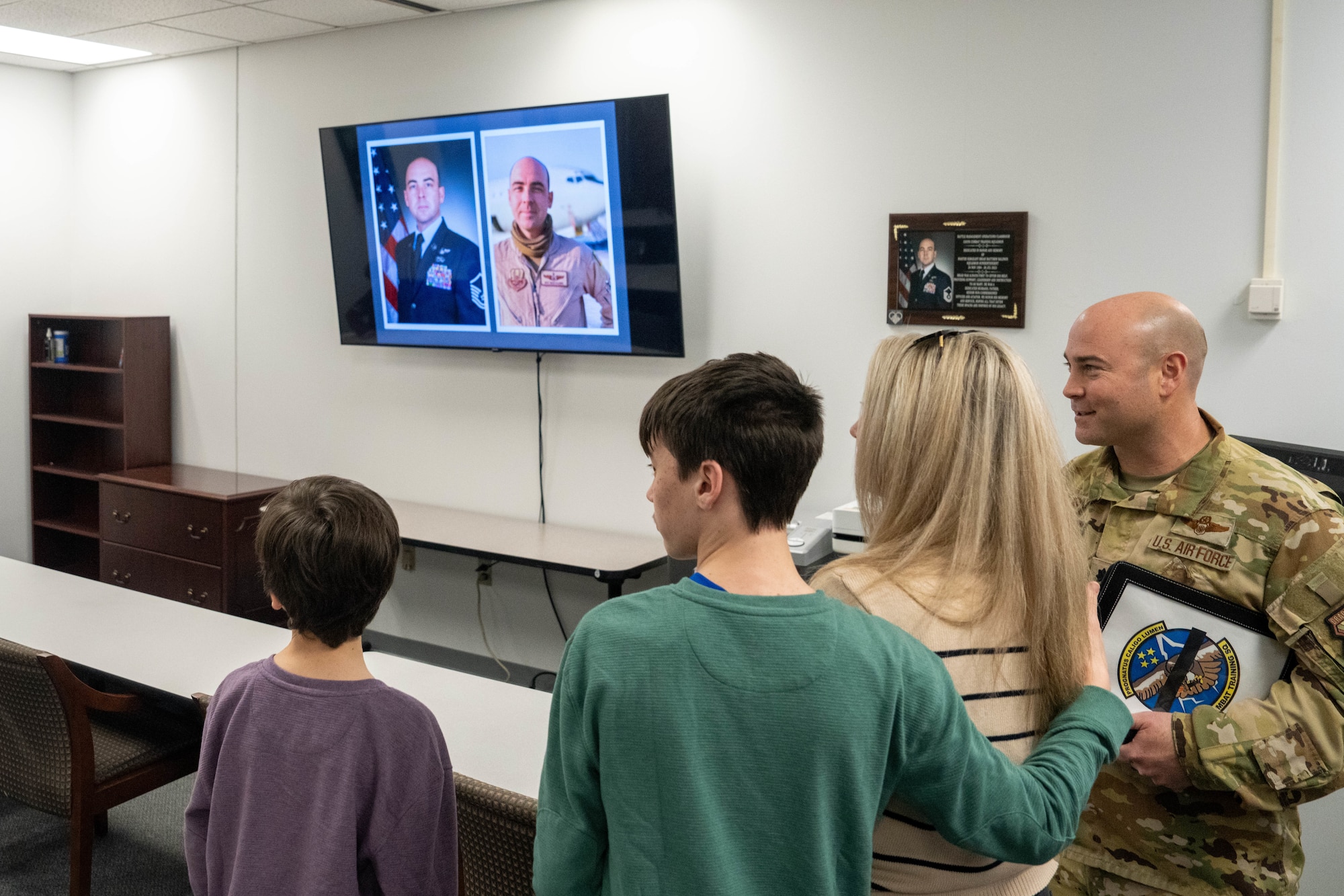 A family is shown a classroom