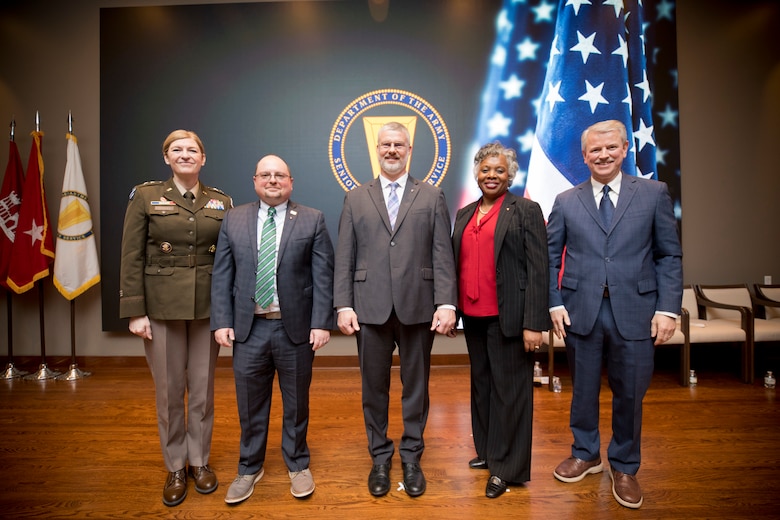 The U.S. Army Engineer Research and Development Center (ERDC) recently inducted Patricia Sullivan, Nick Boone and Dr. Robert Moser into the Senior Executive Service (SES) during a ceremony at ERDC Headquarters in Vicksburg, Mississippi. Maj. Gen. Kimberly Peeples led the induction, with Dr. Pittman highlighting the SES's significance and the leaders' roles in shaping ERDC’s future.  Pictured from lt. to rt: Peeples, Moser, Boone, Sullivan and Pittman