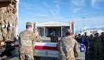 Members of the Defense POW/MIA Accounting Agency load a transfer case for transport during an honorable carry ceremony at Joint Base Pearl Harbor-Hickam, Hawaii, Jan. 28, 2025. The remains were recently disinterred at the Manila American Cemetery and Memorial in the Philippines as part of DPAA’s effort to provide the fullest possible accounting of our missing personnel to their families and the nation. The cases were transferred to DPAA laboratories for scientific analysis and possible identification. (U.S. Air Force photo by Senior Airman Kathy Duran)