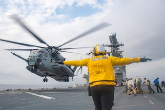 USS America (LHA 6) conducts flight operations in the Philippine Sea.