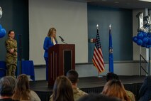 People speak on podium