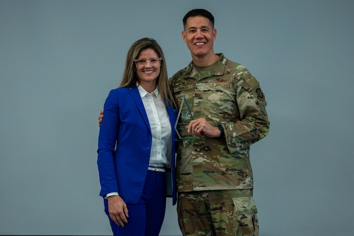 People speak on podium