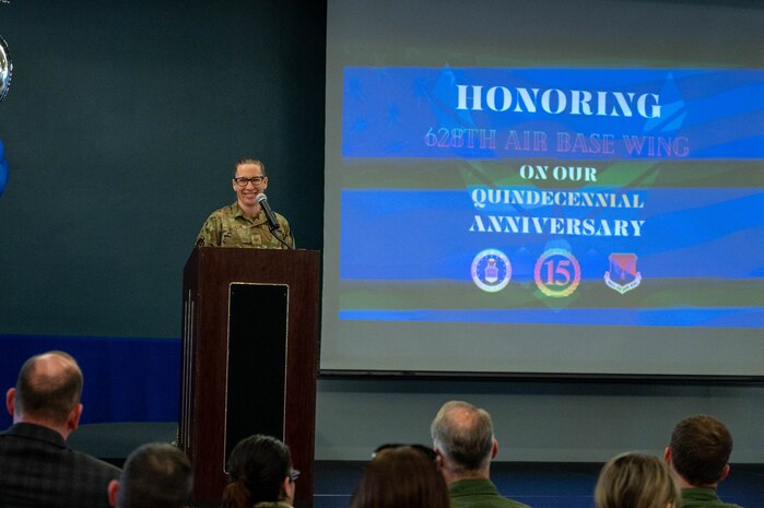 People speak on a podium