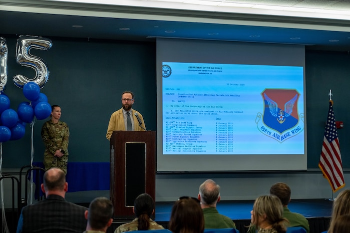 People speak on a podium