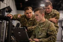 Soldiers assigned to the 10th Mountain Division establish a network system for a command node during the division’s Warfighter Exercise, Oct. 12, 2024, on Fort Drum, New York. WFX 25-01 tests the 10th Mountain Division's ability to maintain seamless communication by rapidly establishing, operating, and relocating command posts in contested and congested environments.

 (U.S. Army photo by Spc. Kade M. Bowers)