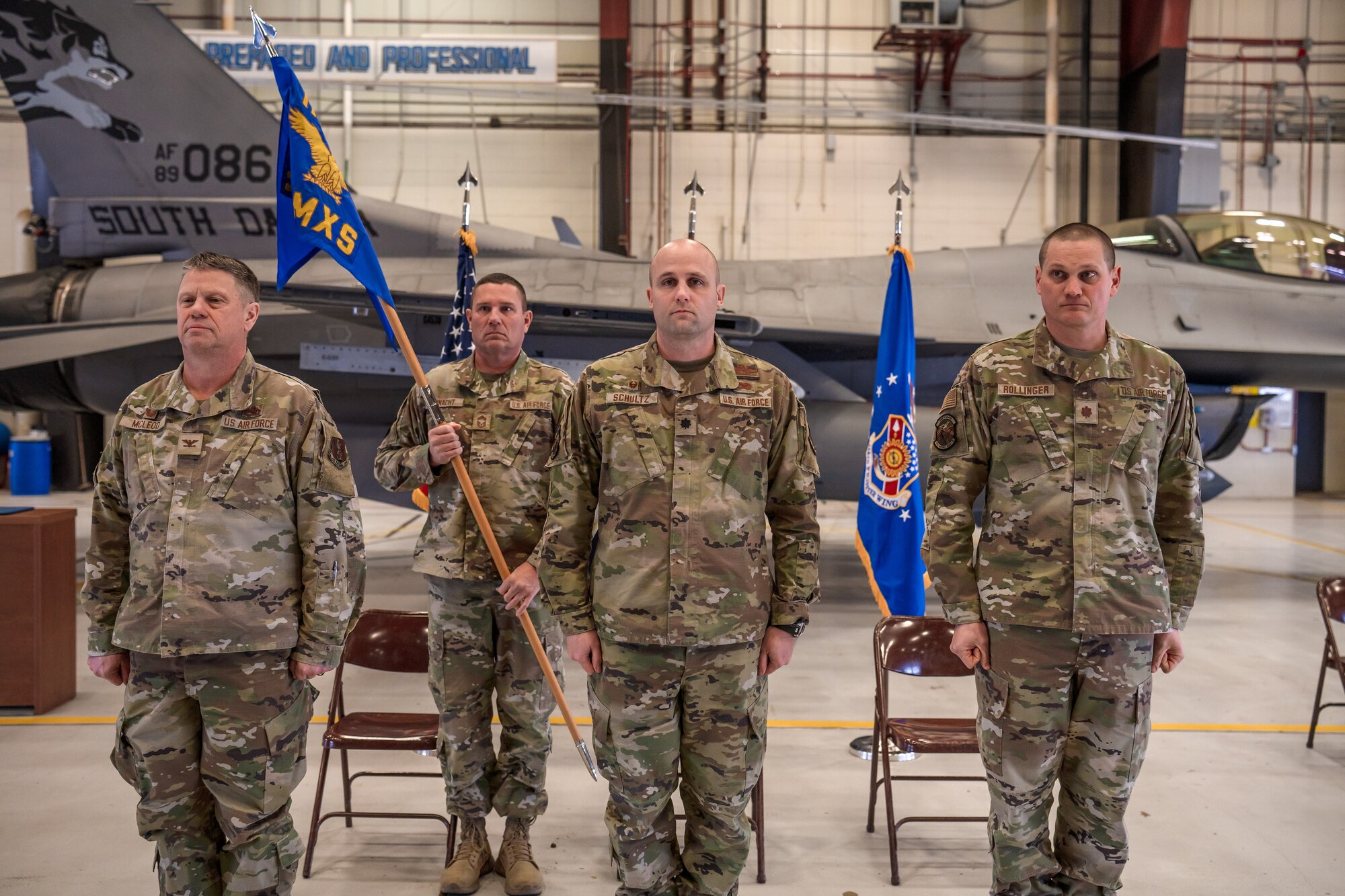 The 114th Maintenance Squadron welcomed a new commander Feb. 2, 2025 at Joe Foss Field, South Dakota. Maj. Ross Rollinger, 114th Aircraft Maintenance Squadron commander, assumed command in lieu of Lt. Col. Steve Schultz, 114th Maintenance Group deputy commander. Col. William McLeod, 114th Maintenance Group commander, presided over the ceremony.