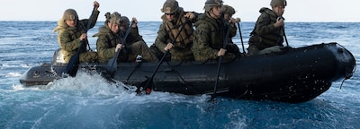 PHILIPPINE SEA (Jan. 29, 2025) — U.S. Marines with Battalion Landing Team 2/4, 31st Marine Expeditionary Unit, paddle away from the stern gate in an enhanced combat rubber reconnaissance craft (E-CRRC) during a launch and recovery sustainment training aboard amphibious transport dock USS San Diego (LPD 22), in the Philippine Sea on Jan. 29, 2025. This training was conducted in order to rehearse and improve launch and recovery procedures during small boat operations. The 31st MEU is operating aboard ships of the USS America Amphibious Ready Group in the 7th Fleet area of operations, the U.S. Navy’s largest forward-deployed numbered fleet, and routinely interacts and operates with allies and partners in preserving a free and open Indo-Pacific region. (U.S. Marine Corps photo by Lance Cpl. Gerardo Mendez)