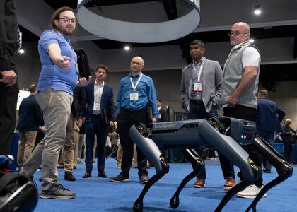Richard Capewell, software engineer at Naval Information Warfare Center Pacific, gives a demonstration of the Boston Dynamics Spot to industry partners during WEST Conference 2025.