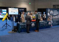Naval Meteorology and Oceanography Command representatives explain their mission and capabilities to industry partners during WEST Conference 2025.
