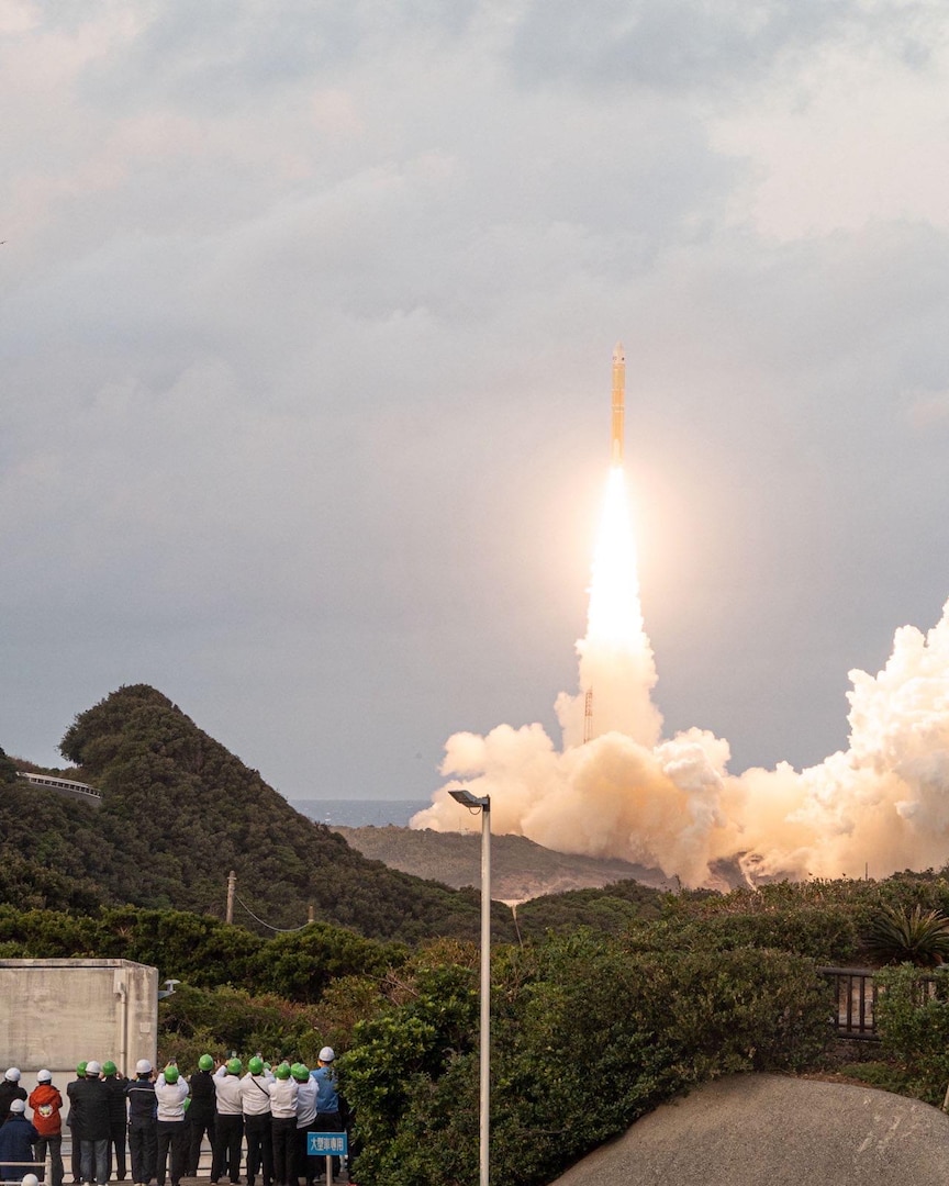 A joint delegation of U.S. and Japanese military and civilian representatives watch as a U.S. space domain awareness payload hosted on Japan's Quasi-Zenith Satellite 6 (QZS-6) successfully launched on a Japanese H-3 launch vehicle from the Yoshinobu Launch Complex at the Japan Aerospace Exploration Agency’s (JAXA) Tanegashima Space Center (TNSC) on February 3, 2025. This is the first bilateral U.S.-Japan cooperative space effort focused on national security, and the first of two launches as part of the Quasi-Zenith Satellite System Hosted Payload (QZSS-HP). (U.S. Air Force photo by Senior Airman Jacob Wood)
