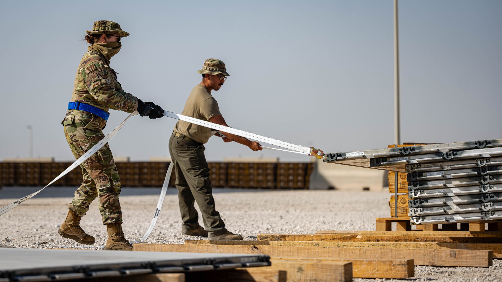 Airmen prepare aircraft pallets.