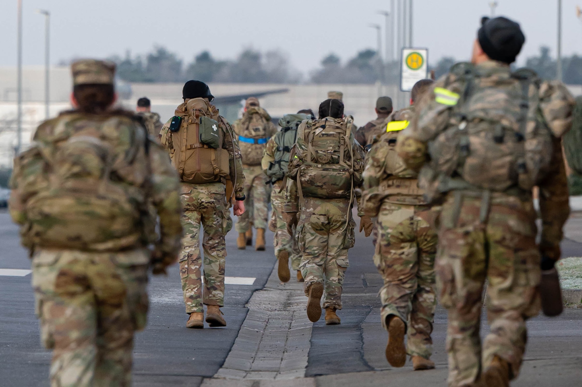 Airmen and Soldier ruck together.