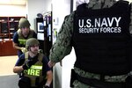 Naval Air Station Pensacola Naval Security Forces conduct an active shooter and hostage scenario training exercise.