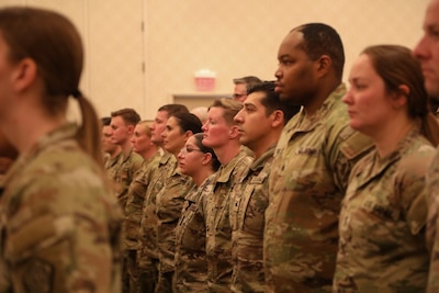 34th Infantry Division Sustainment Brigade Soldiers assemble into formation in front of their family and friends. They come together for a proper welcome home after 11 long months away from their friends and families.