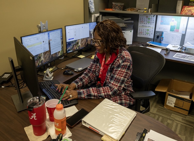 Picture of woman at desk.