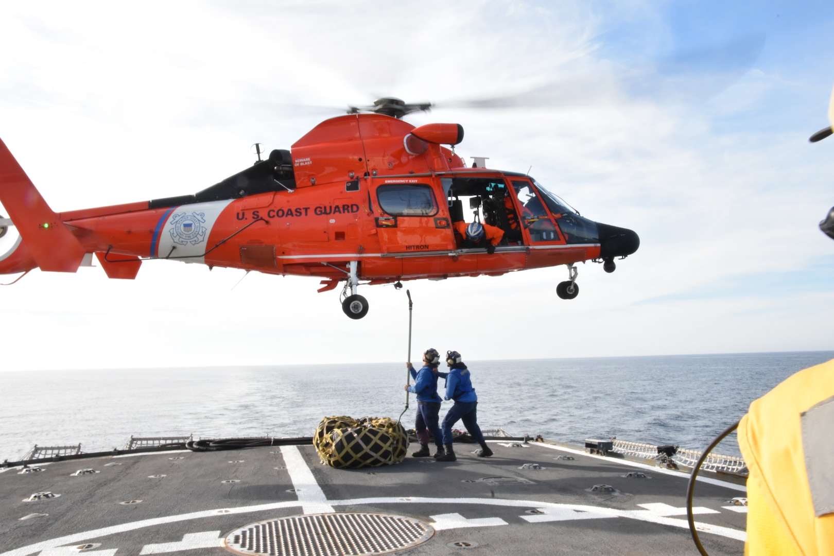 U.S. Coast Guard Cutter Campbell (WMEC 909) crewmembers conduct training at sea with aircrews from the Coast Guard Helicopter Interdiction Tactical Squadron, Jan. 30, 2025, off the coast of Florida. Campbell also embarked nearly sixty personnel from other Coast Guard cutter crews for hands-on shipboard-helicopter operations training. (U.S. Coast Guard photo by Petty Officer 3rd Class Chasey Oltman)