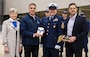 Ellyn Metcalf, Vice President of Education at National Medal of Honor Museum Foundation, Chris Cassidy, President and CEO of the Museum Foundation, accept Douglas Munro’s Medal of Honor from Master Chief Petty Officer Shawn Burns, Command Master Chief of the Eight Coast Guard District and James Brundage, Director of Programs and Exhibits for the National Coast Guard Museum, Jan. 28, 2025 (U.S. Coast Guard photo courtesy of Petty Officer 3rd Class Perry Shirzad)